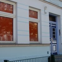 09-Graffitientfernung-in-Rostock-Garagentor-Fassade-reinigen-Farbe-einlesen